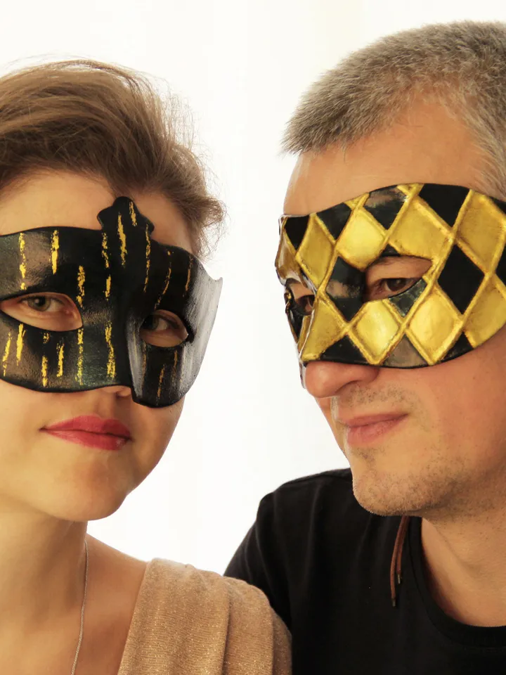 Masquerade mask  men to carnival costume at new years eve party. Gold and black Venetian mask men to carnival birthday party.
