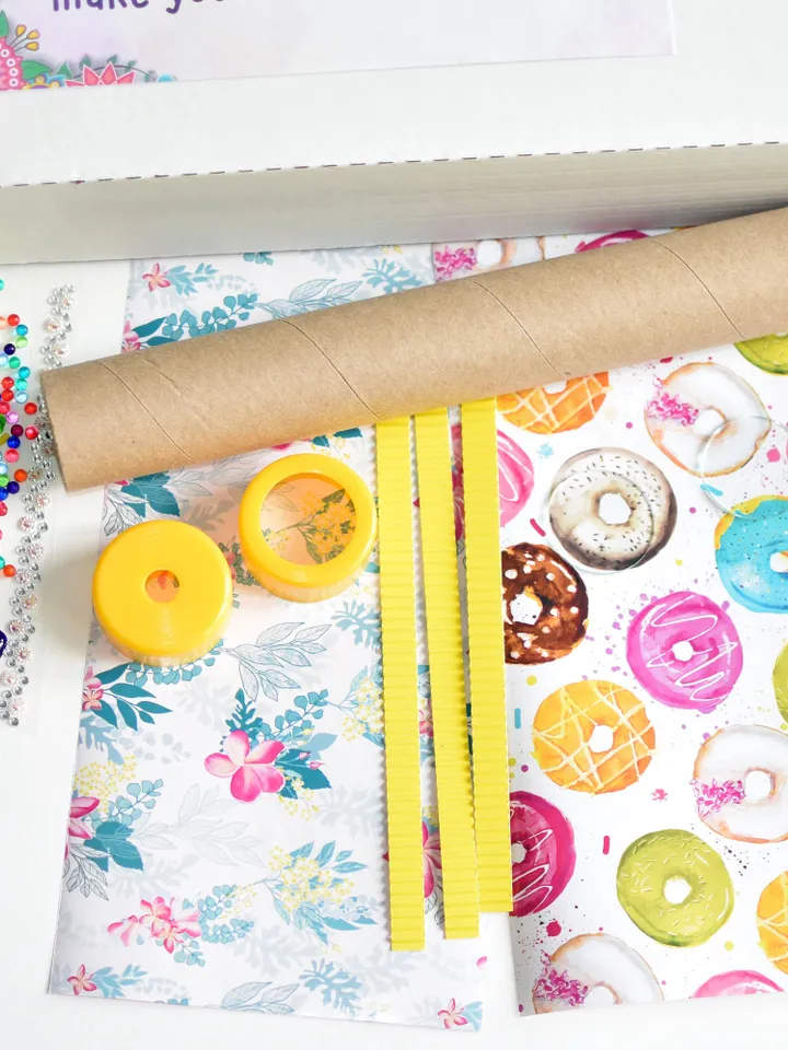 DIY kaleidoscope kit. Activity box with adult craft kit for Christmas eve box. Stim toy kids craft kits as science gifts.