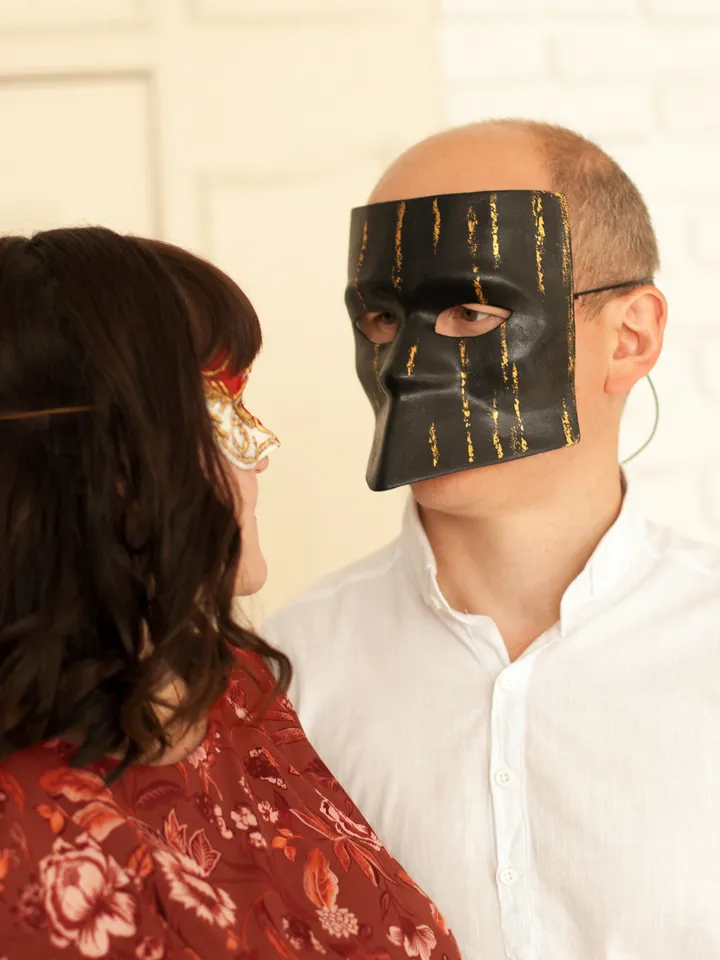 Masquerade mask men to carnival costume for new years eve party. Bauta mask. Gold and black Venetian mask men.