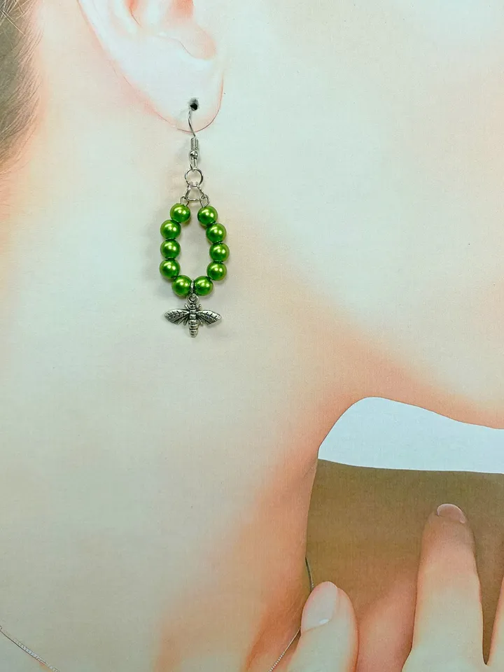 Earrings with green flies. Handmade jewelry.
