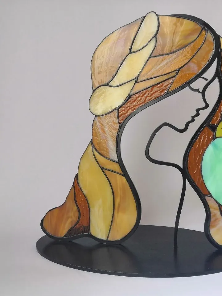 Girl with a Bird. Tiffany Stained Glass, Stained Glass Featuring a Girl and a Bird, Stained Glass with a Girl and Bird on a Stand, Stained Glass "Girl and Bird" on Base, Stained Glass Featuring a Girl and Bird