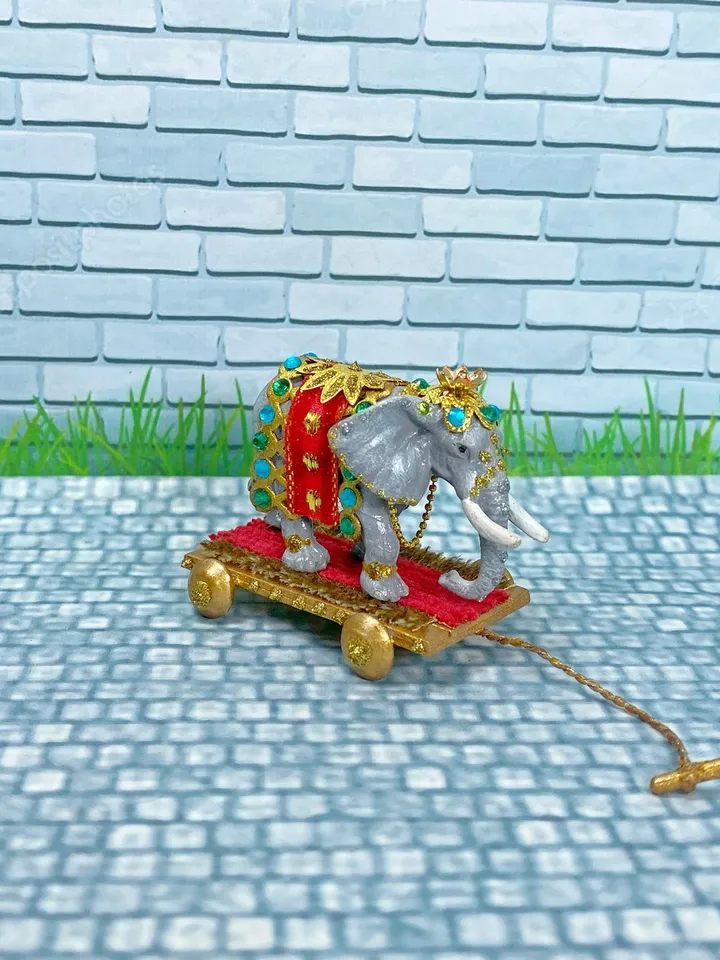 Elephant on a cart. Miniature. 1:12. Toy for a doll. Elephant. Animal for a doll.
