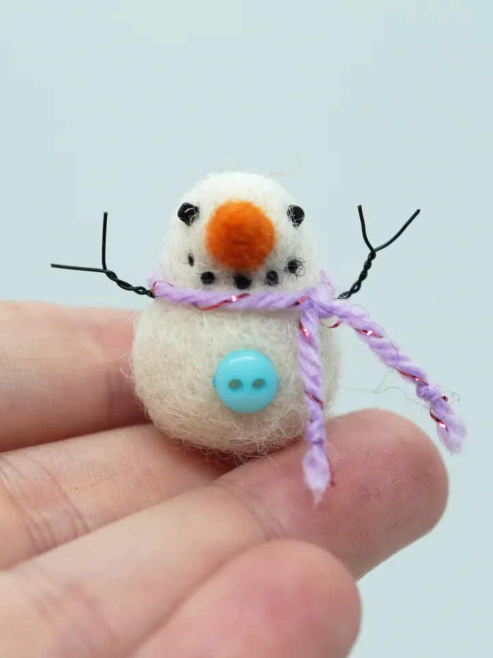 Tiny needle felted snowman, purple scarf