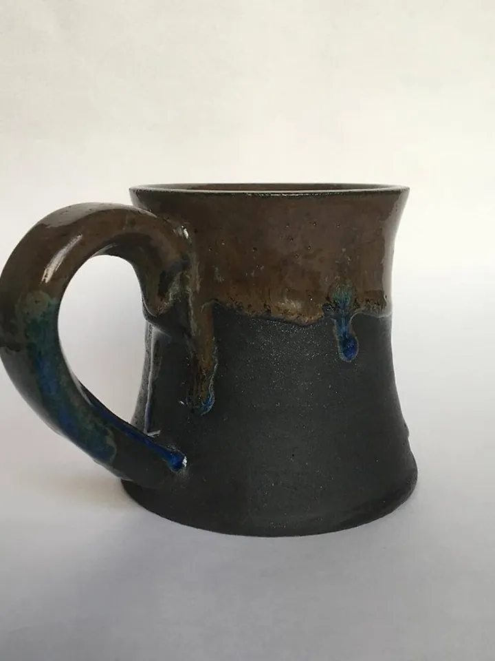 Brown, blue and black glazed stoneware mug