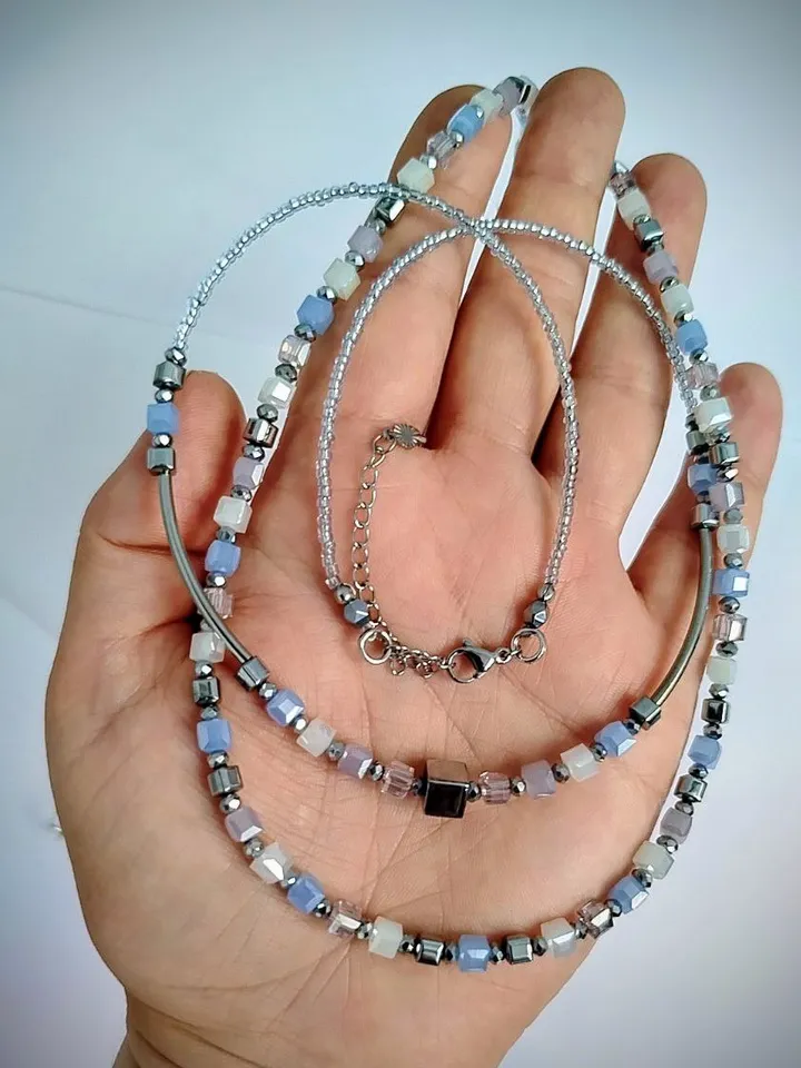 Handmade set of necklaces and earrings with cube beads. Geometric jewelry