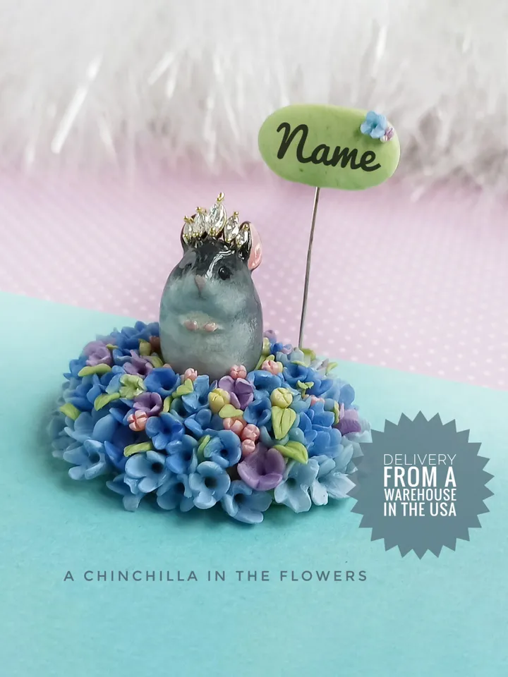 a tiny chinchilla figurine on the blue flower base with nameplate (US discount)