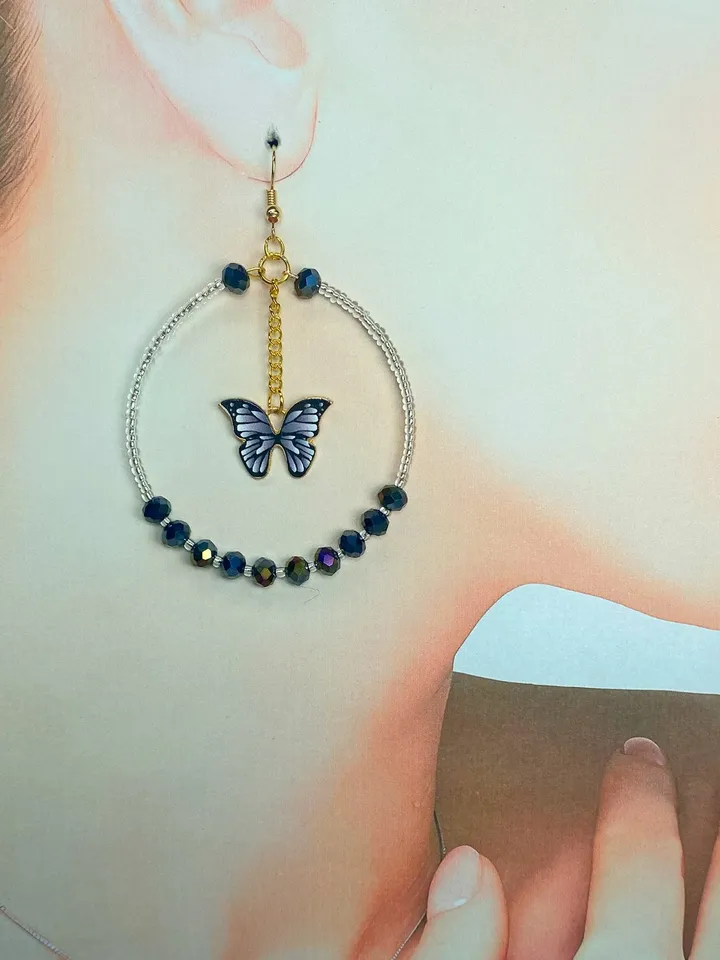 Earrings with butterflies. Handmade jewelry. Individual design.