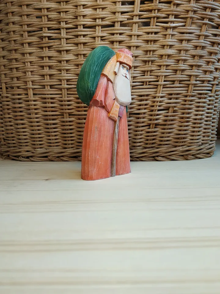 Wooden figurine of Santa Claus.