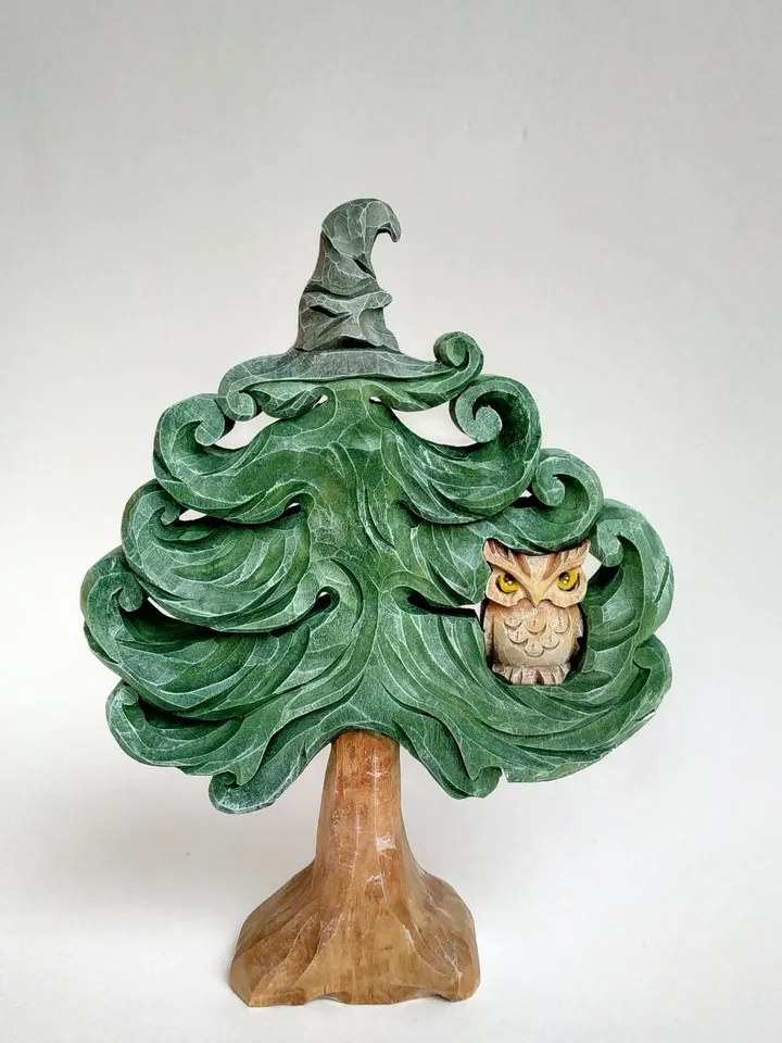 Christmas tree puzzle in a hat from Hogwarts with an owl.
