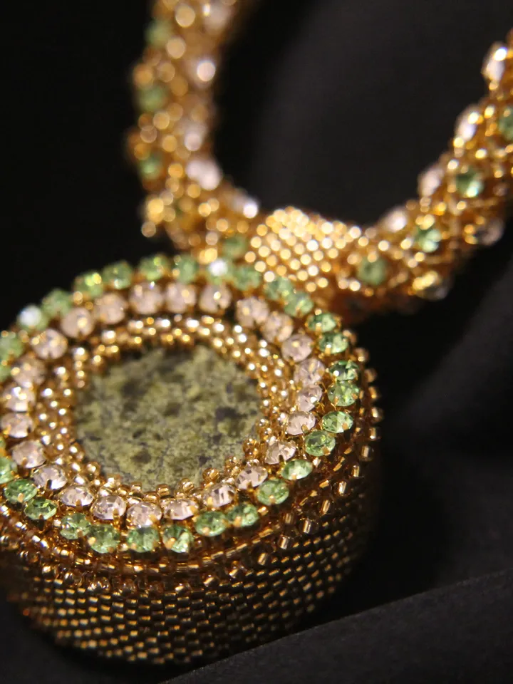 Pendant Japanese beads with a coil and rhinestones
