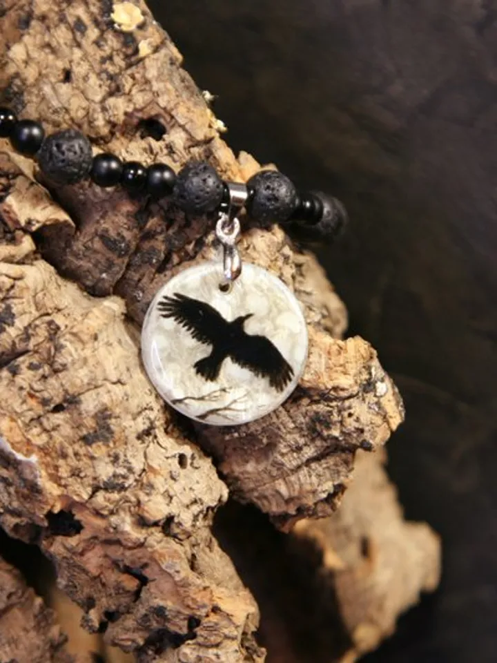 Raven or crow necklace with love rune on the other side. Nacre pearl pendant