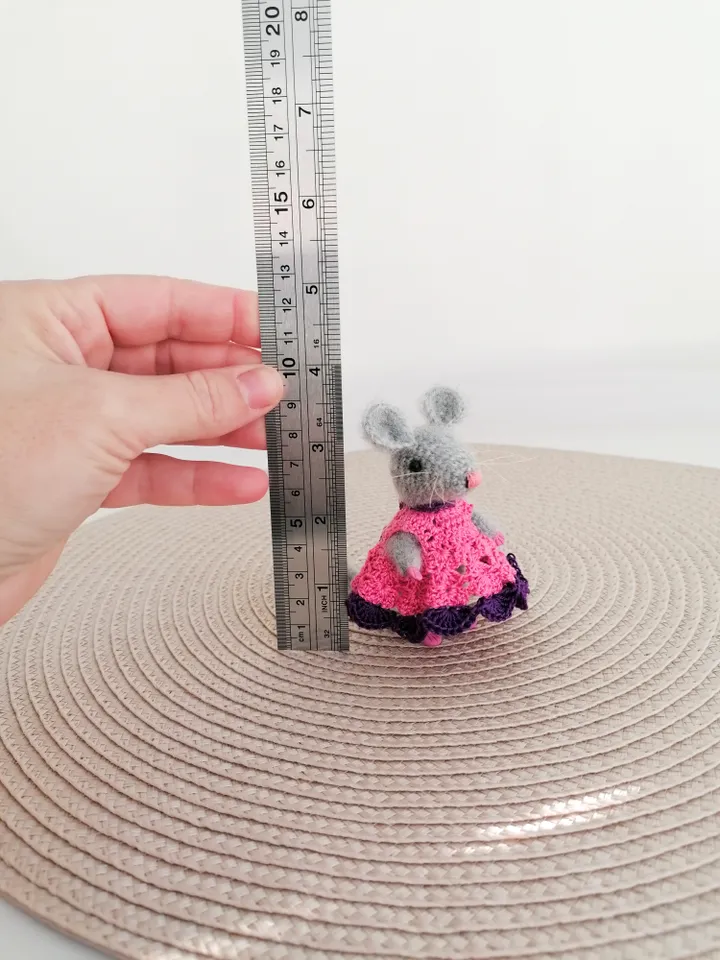 mouse in a crocheted dress