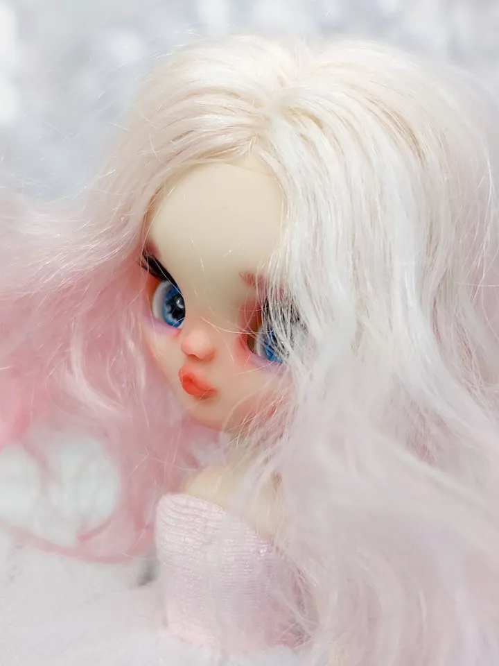 Petite Blythe doll with pink hair. Small doll with eye mechanism. Doll with a kiss.