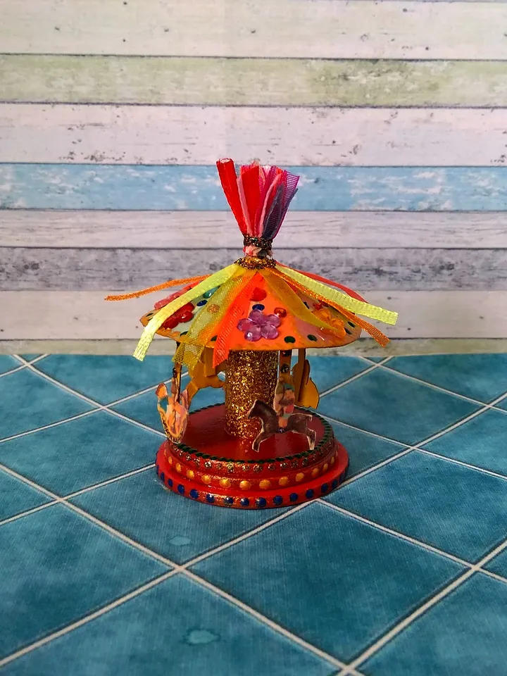 Miniature carousel. Dollhouse miniature.1:12 scale.