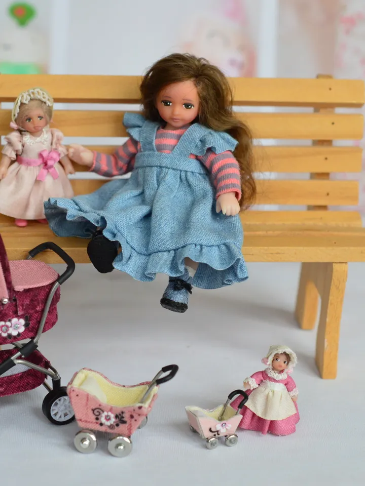 Miniature doll. Doll girl. Doll for a dollhouse.1 12 scale.