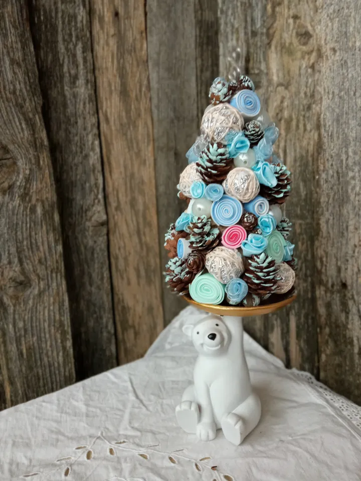 Fabulous handmade Christmas tree on a stand with a teddy bear
Xmas home decor indoor. Christmas ornament