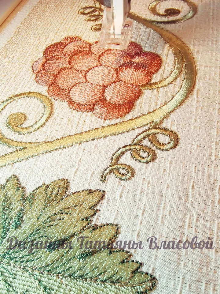 "EMB Grapes tapestry" is a working file format.