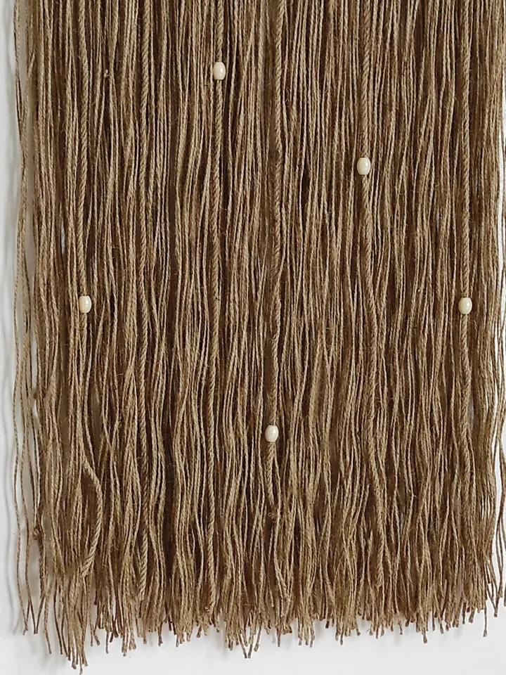 Tapestry and vase