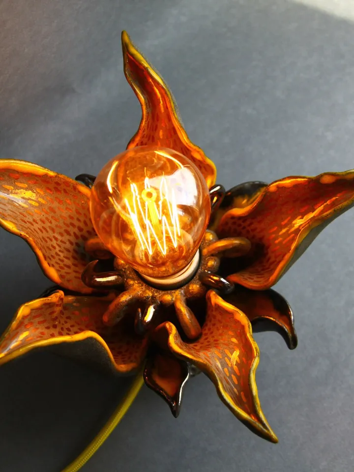 Altar table or witch starter kit can complement unique ceramic table lamp