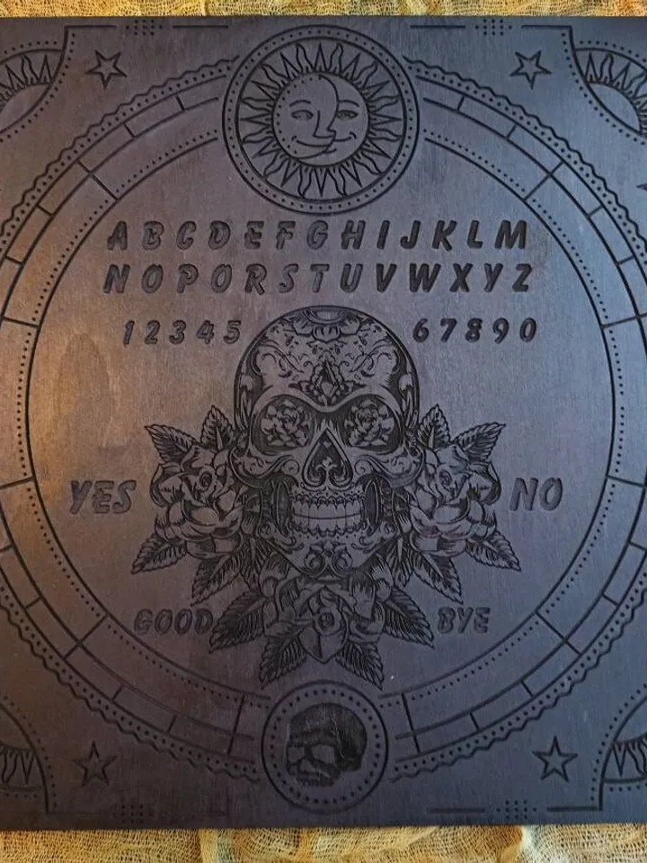 Ouija board , Spirit board , Occult art