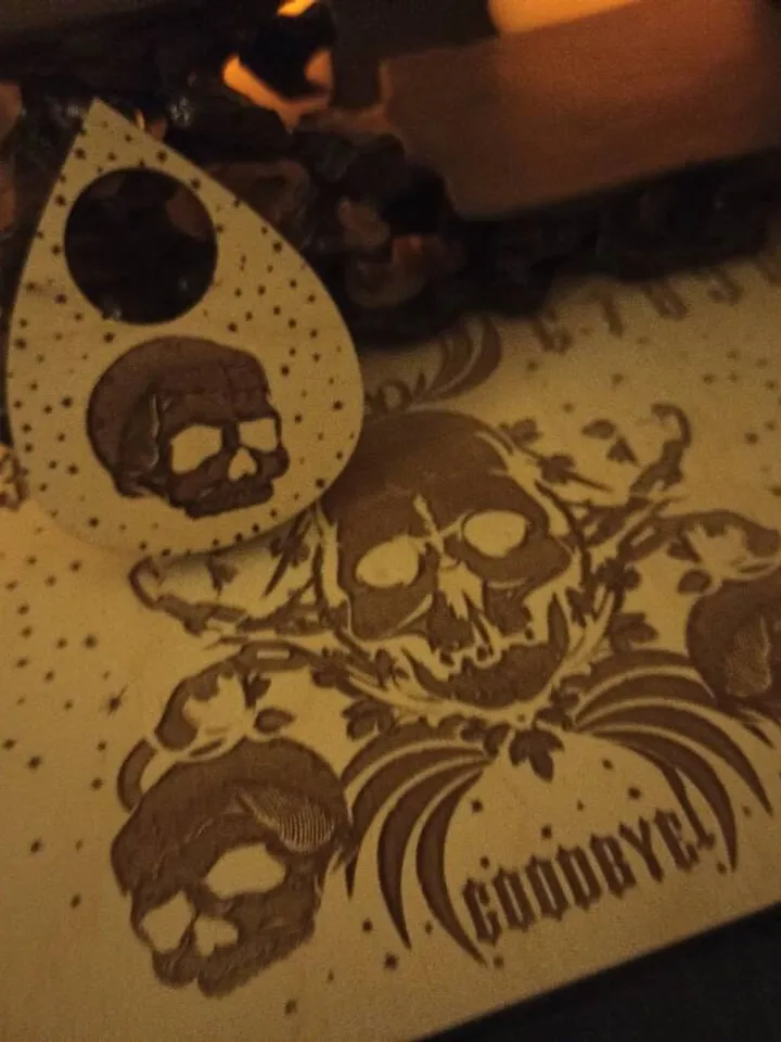 Divination board , ouija board , pendulum board , talking board , spirit board