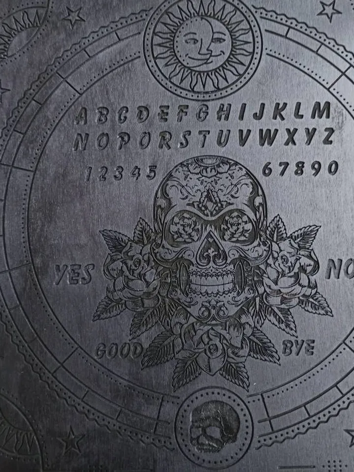 Ouija spirit board , divination board