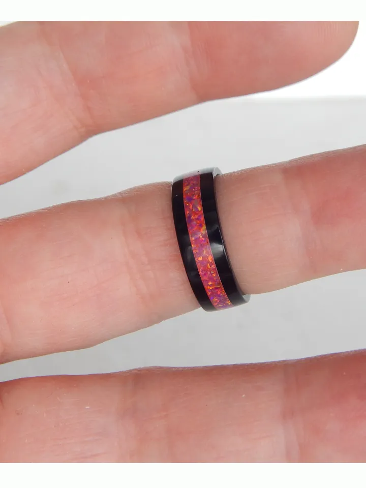 Stylish black ring. Carbon ring with synthetic opal. 8