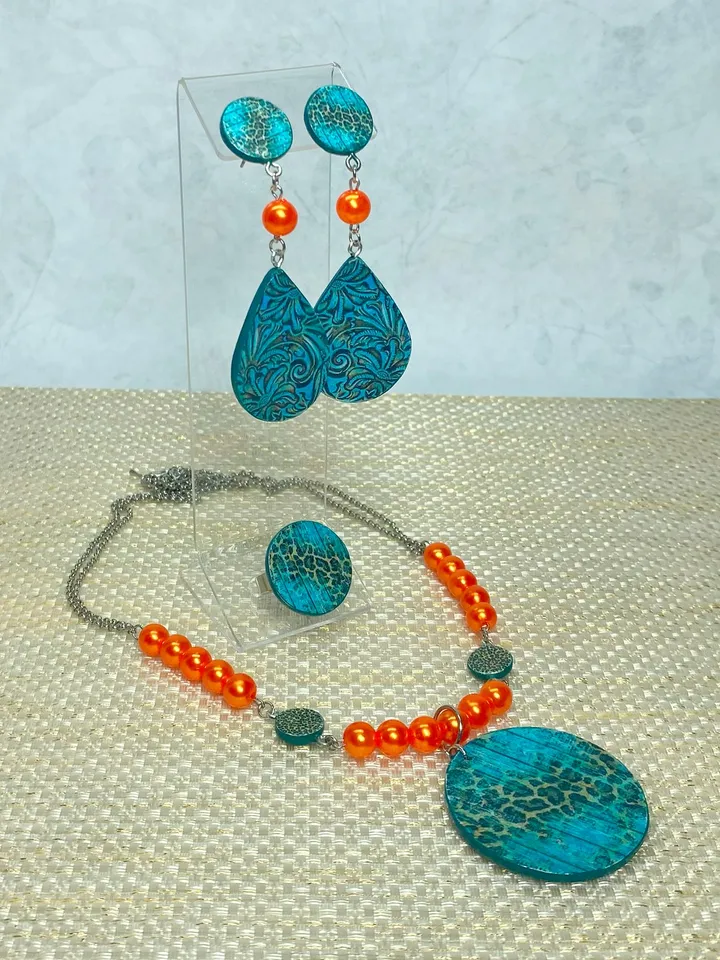 Bright set of handmade jewelry. Individual design.