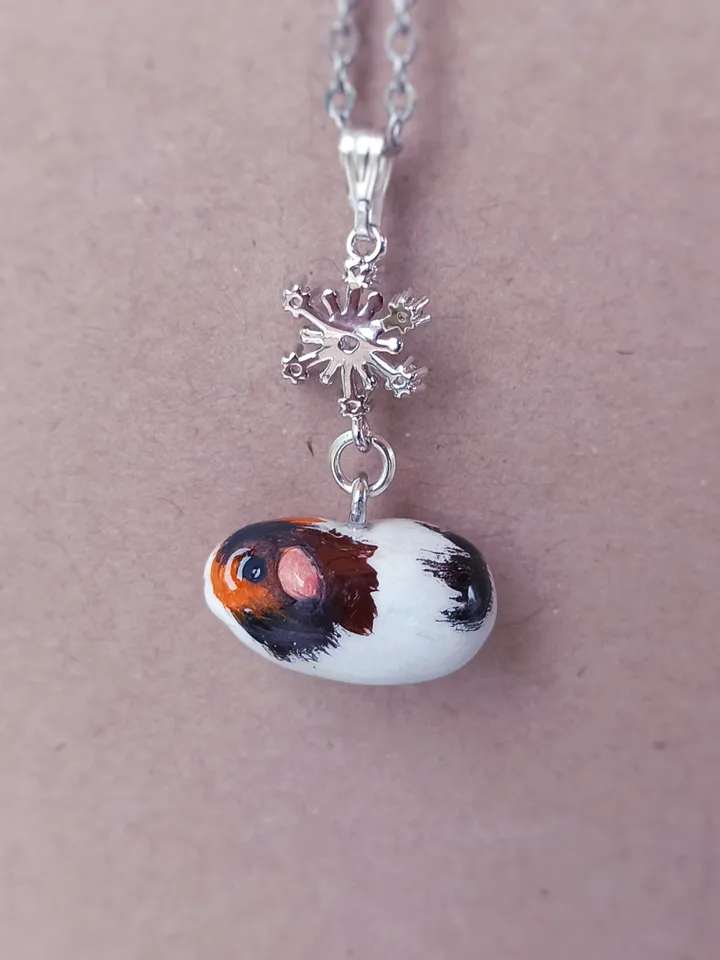 a Handmade guinea pig necklace rundom color  (pre-order)