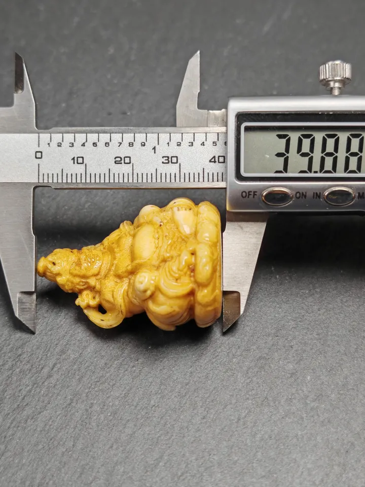 Gandhanra Antique Consecrated Tibetan Buddha statue - Yellow Jambhala(Dzambhala),Carved from Deer Antlers,40mm × 30mm × 20mm