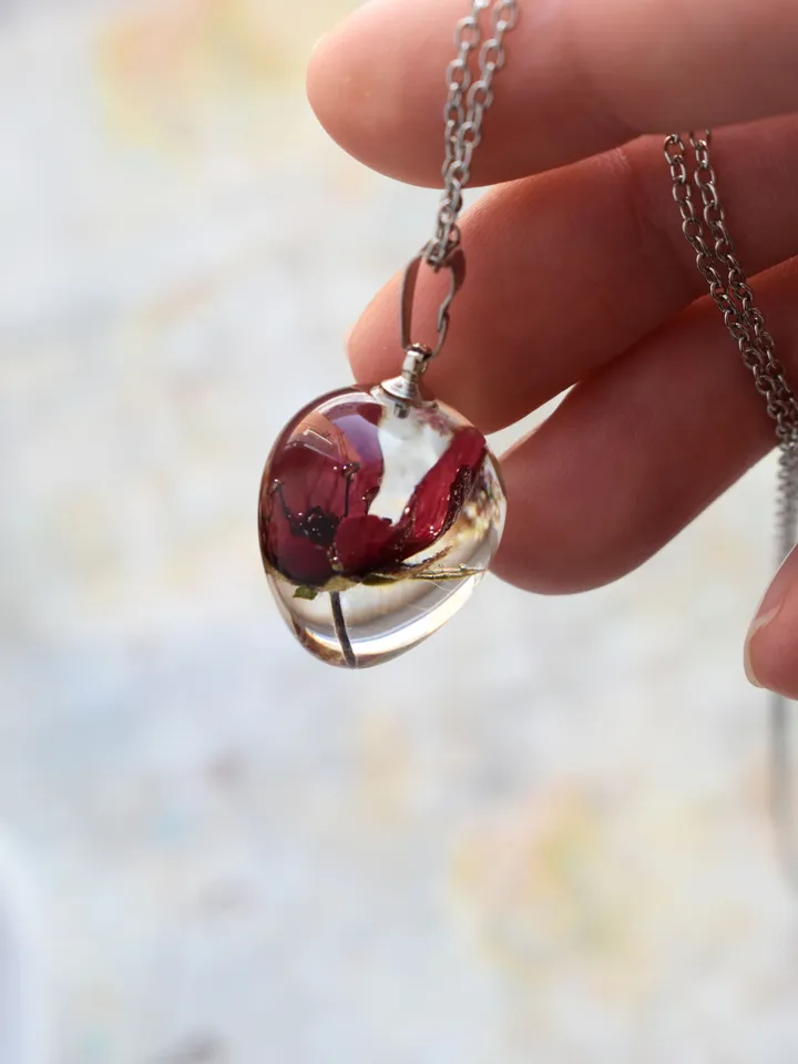 Real cinquefoil necklace. Red flower pendant in resin. Forest Jewelry.