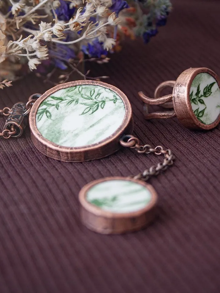 Unique handmade porcelain pendant in a copper frame made using the electroforming process
