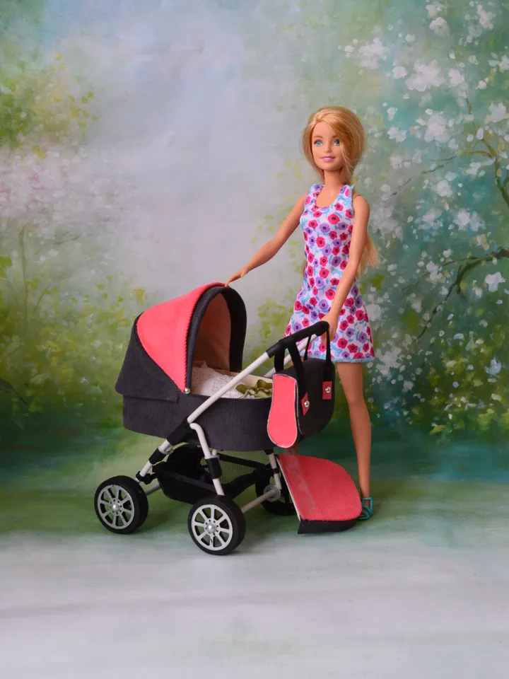 Miniature toy stroller for Barbie dolls.