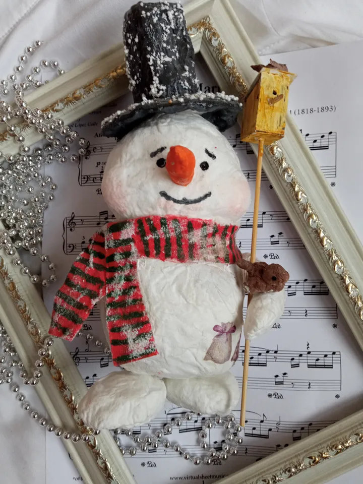Funny Christmas snowman with birdhouse. Handmade. Xmas holidays. Christmas season. Christmas ornaments