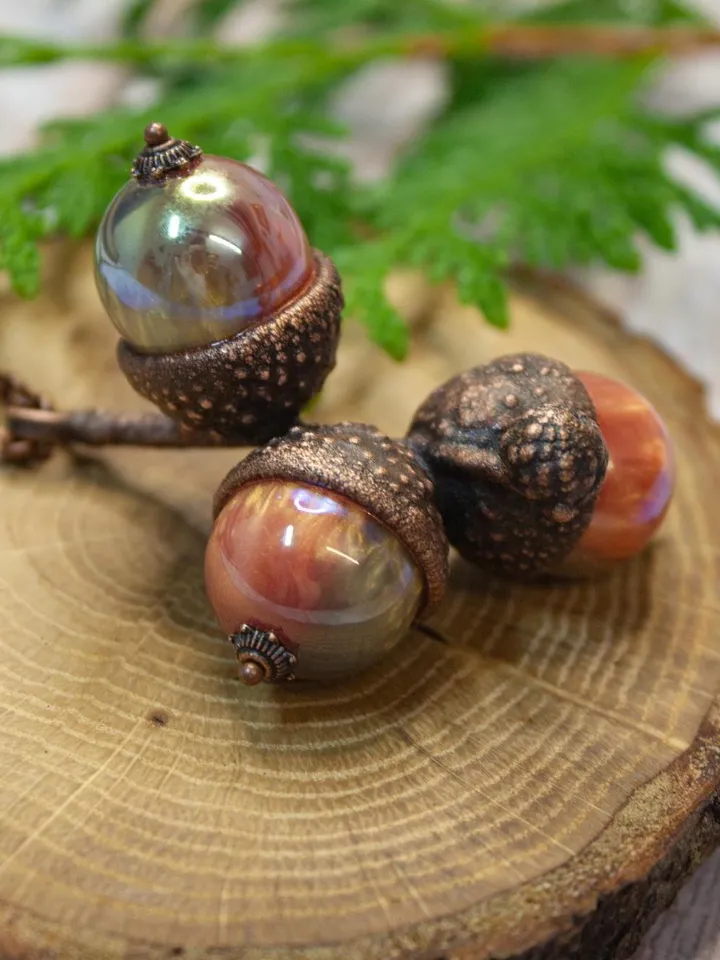 An original handmade electroformed copper pendant made from natural acorn caps in a single copy.