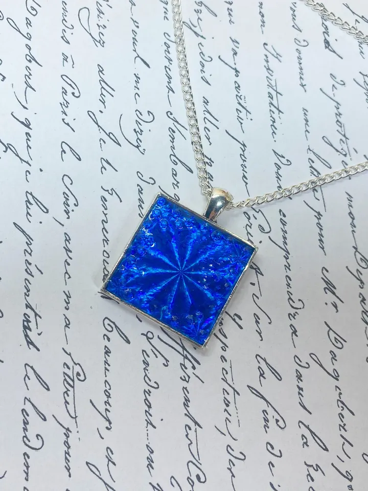 Bright blue 3D handmade pendant. Author's design. Handmade.
