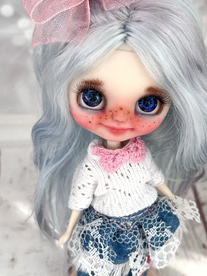 Small Blythe doll with blue eyes. Beautiful miniature Blythe doll with blue hair.