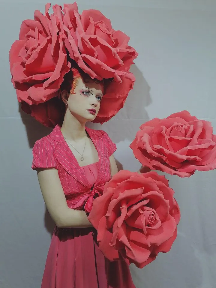 A set of headdress and roses on hands, roses on the head, a headdress from roses, a burning man, festival clothing, a suit for the show,set