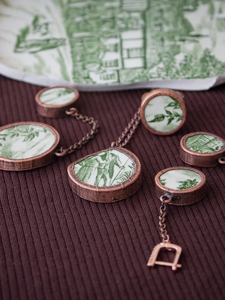 Unique handmade porcelain pendant in a copper frame made using the electroforming process