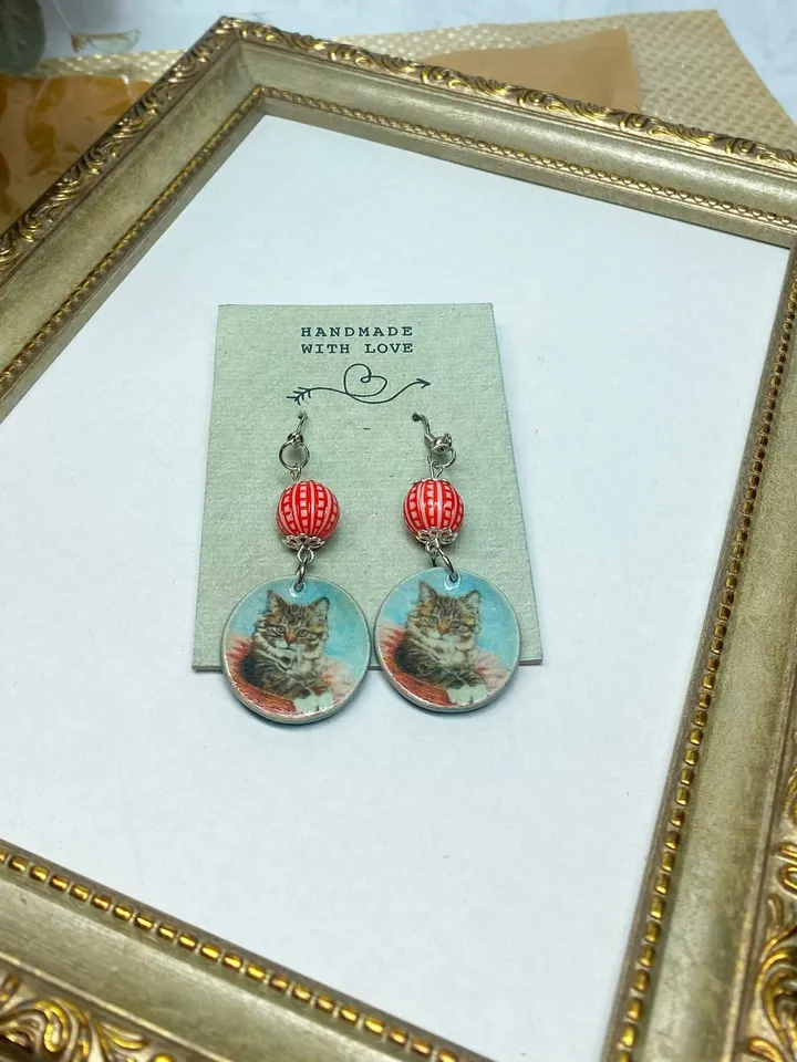 Handmade earrings. Earrings with beads. Handmade. Author's design. Earrings with images of cats.