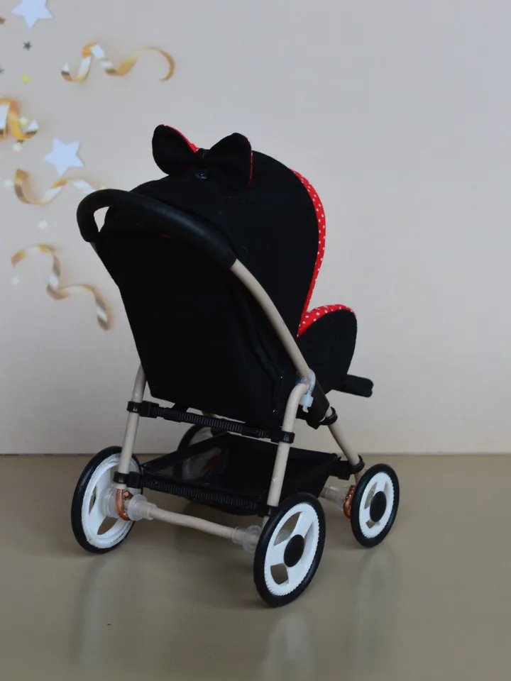 Miniature toy stroller for dolls in 1/6 scale. Accessories for small dolls and poupins. Pram for Barbie doll.