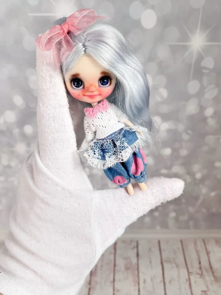 Small Blythe doll with blue eyes. Beautiful miniature Blythe doll with blue hair.
