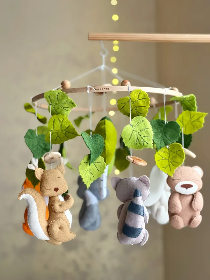 Woodland nursery mobile crib