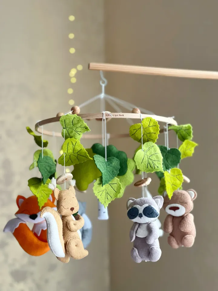 Woodland nursery mobile crib