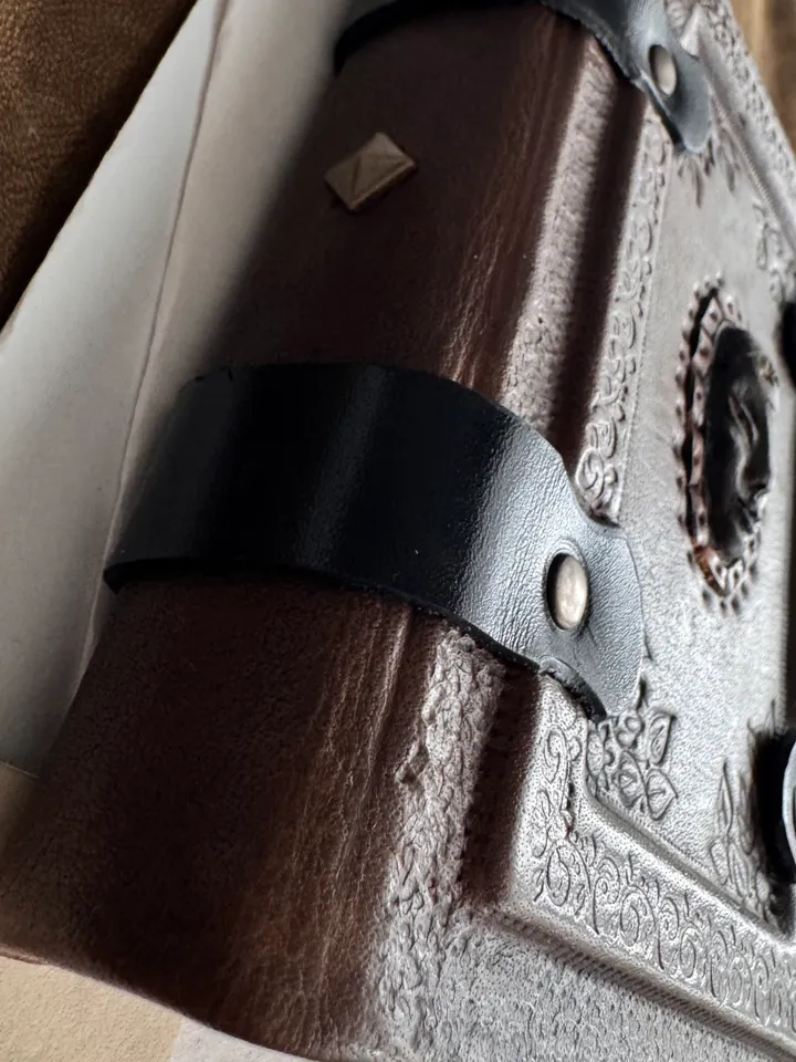Leather notebook with mask