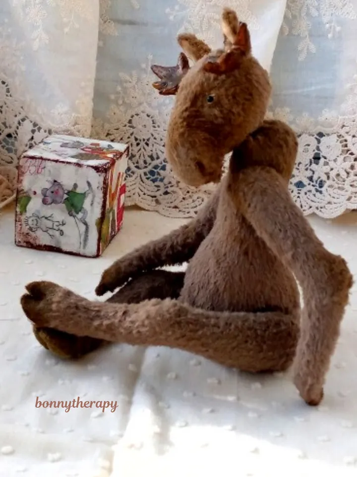Teddy moose, cuddly plush elk in teddy style 6.6 inches sitting.
