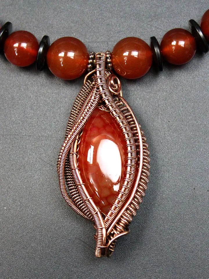 Handmade copper pendant with agate.