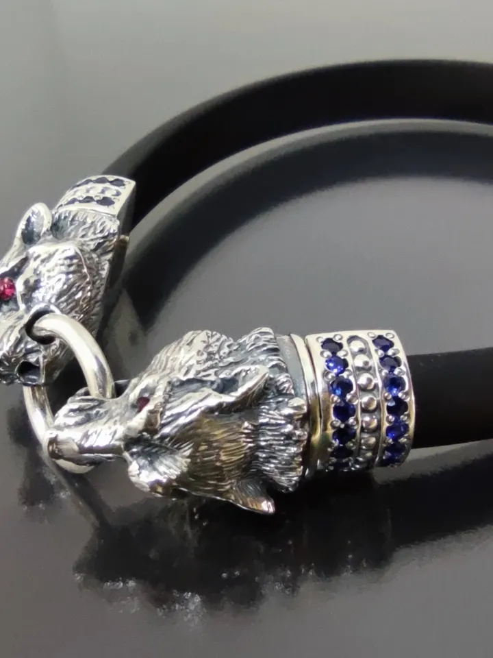 Luxurious bracelet Wolves - inlaid with natural sapphires, rubies