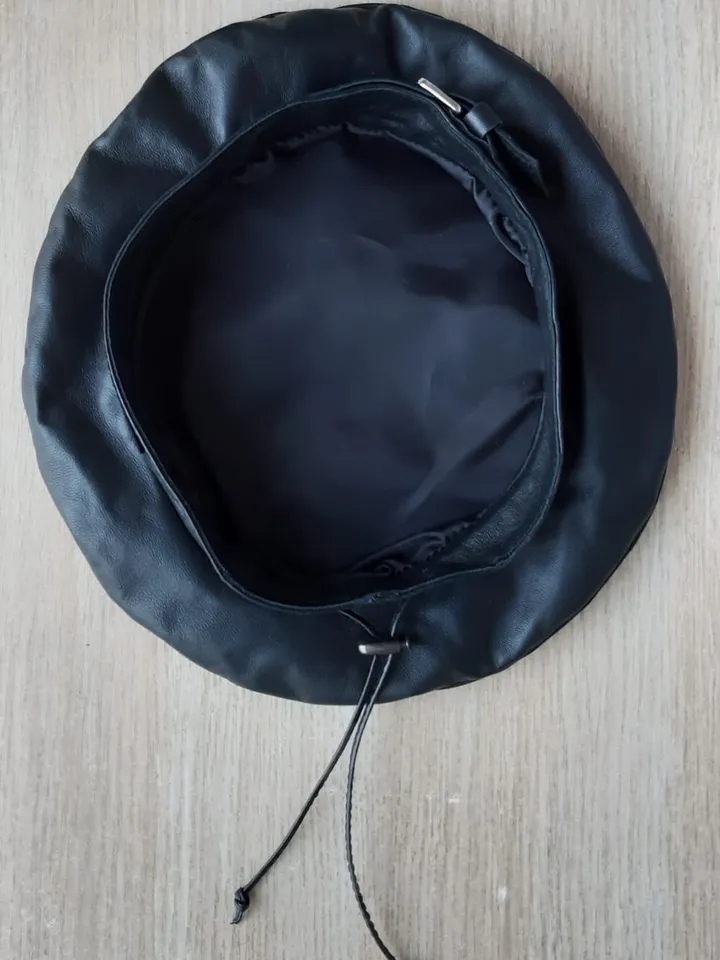 Beret of soft genuine leather with applique, decorated with a buckle. Leather hat for spring
