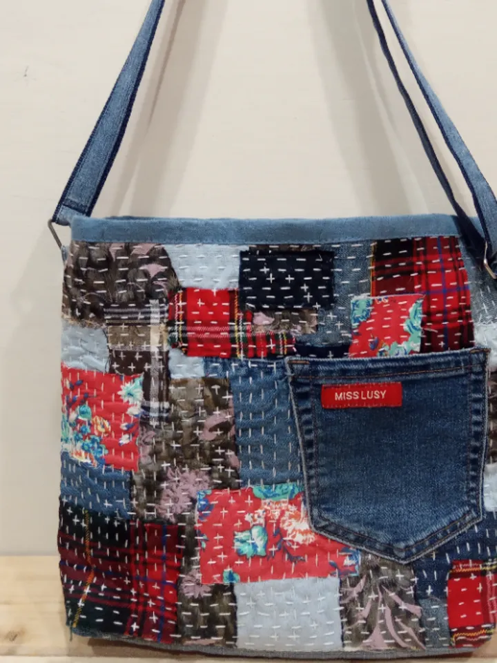 Pretty quilted handbag in the patchwork and boro style made of pieces of denim and cotton